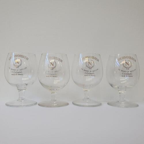 Four small Courvoisier Cognac glasses in one lot*