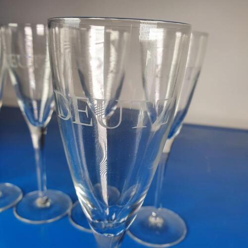 12 x Champagne Deutz flutes, Champagne Deutz corkscrew & badge in one lot